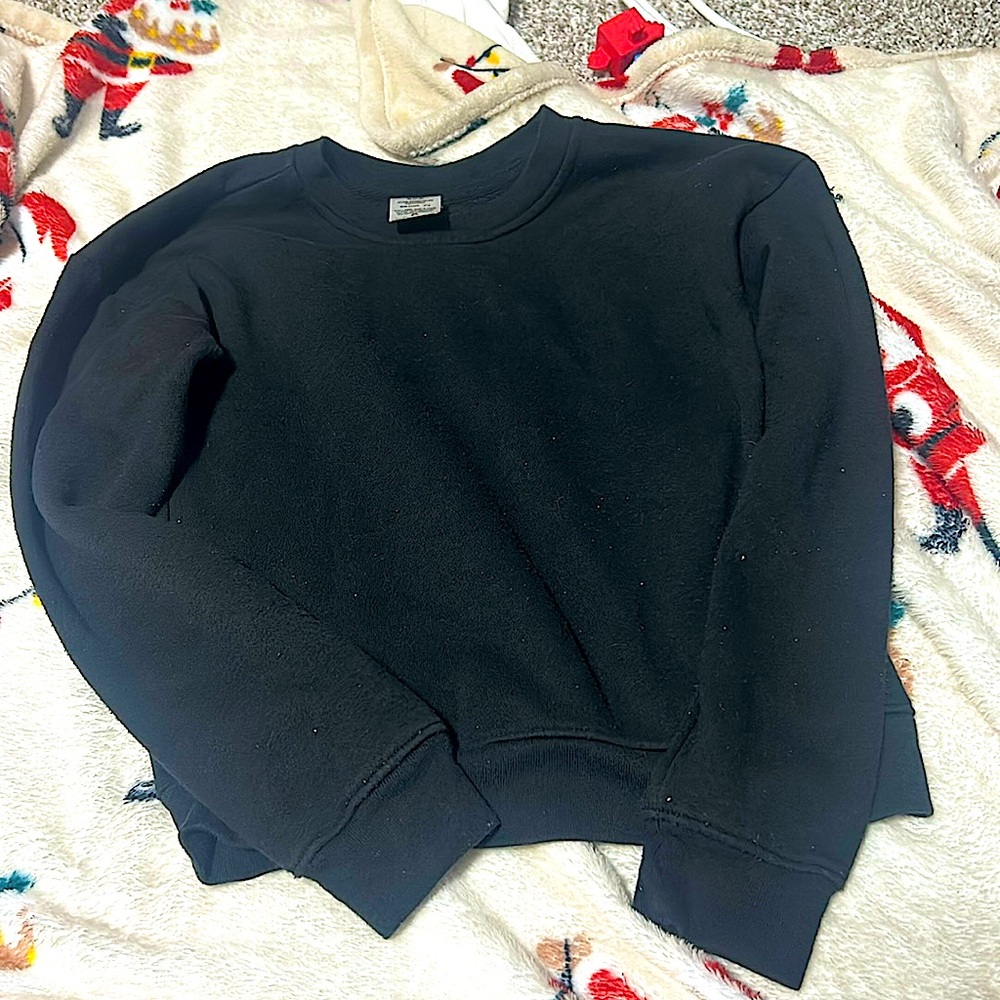 Little girl, black sweatshirt
